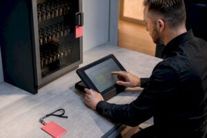 Access control terminal beside secure key cabinet